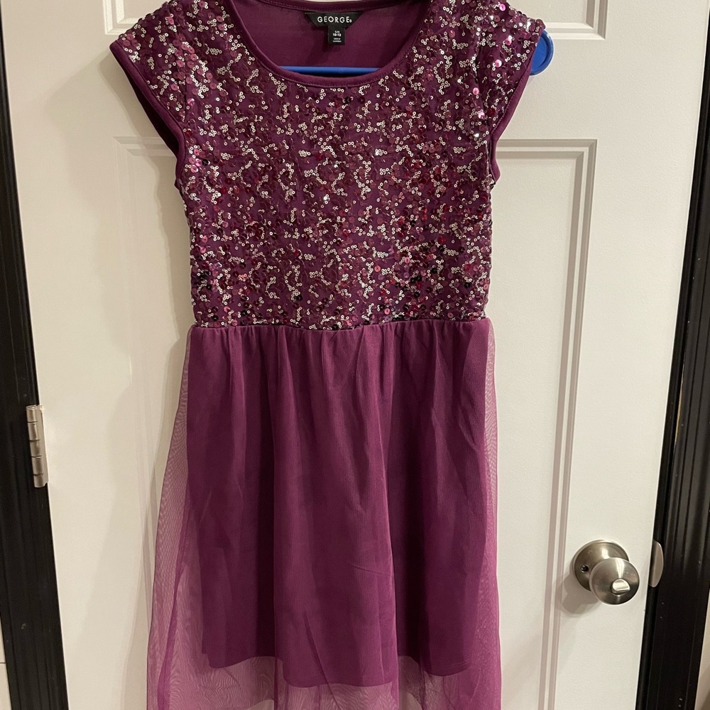 Girls Dress more of a maroon color.